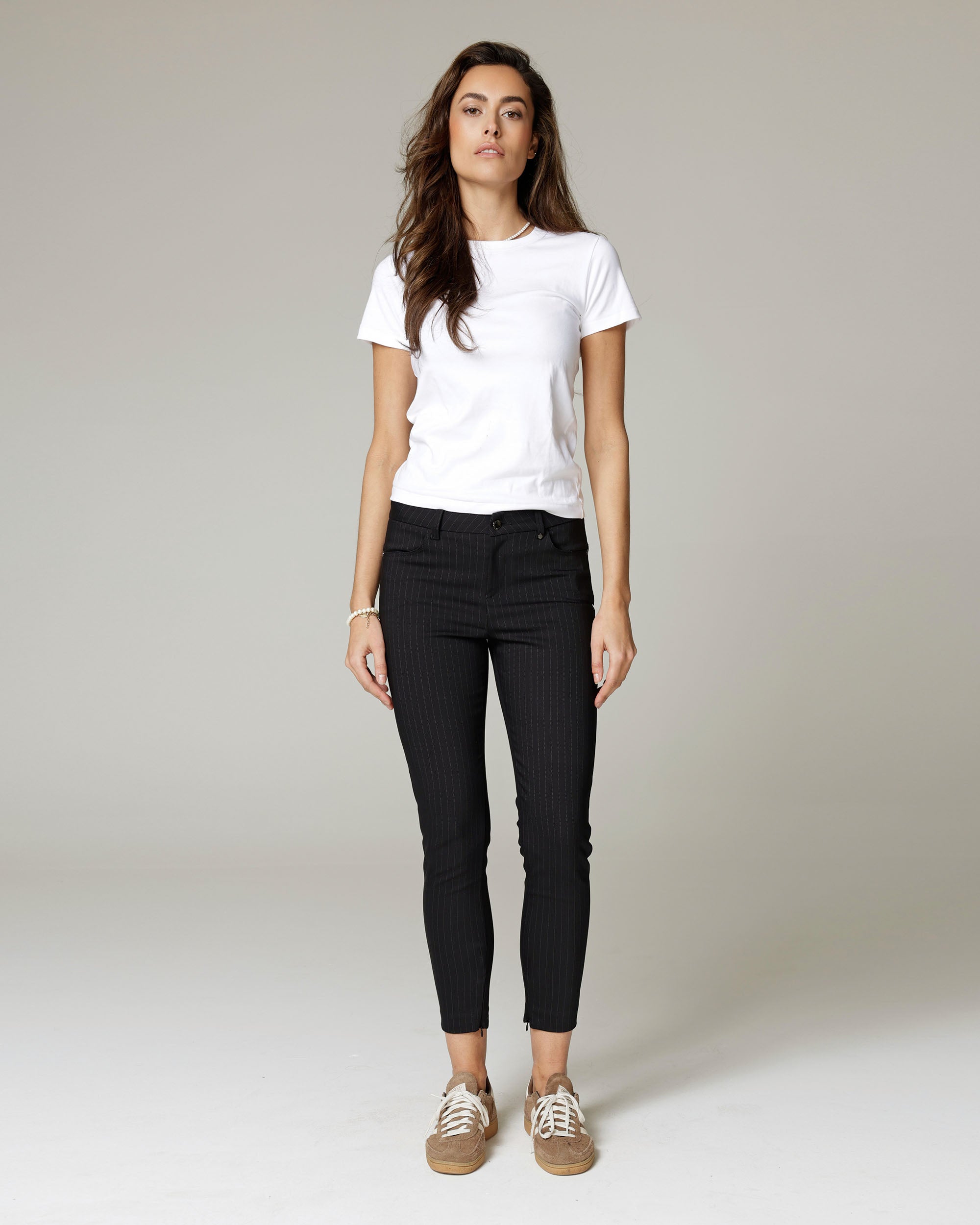 Black Pinstripe Skinny Trousers | The Amara Hauptbild
