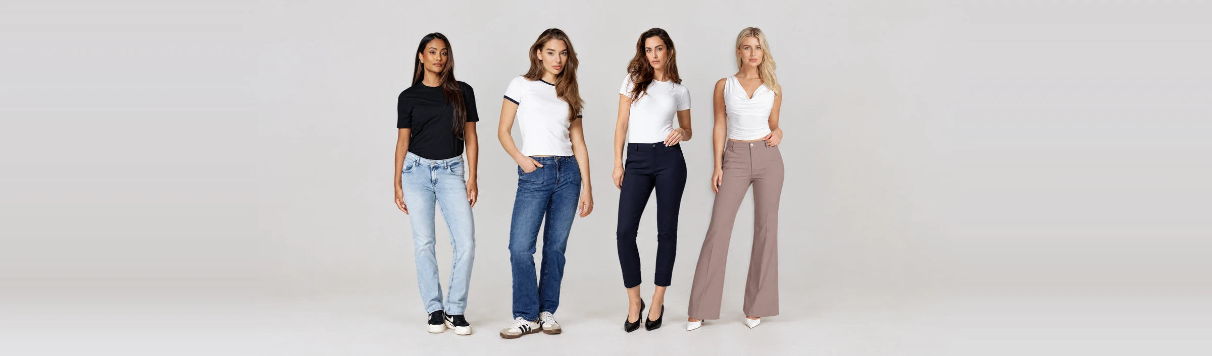 Four women in Good Morning Universe jeans and trousers